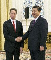 Geithner meets Xi