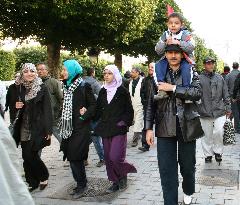 Tunisians celebrate 1st anniversary of revolution