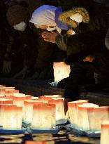 Lantern floating on eve of tsunami anniv.