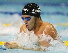 Kitajima cruises into 100 breaststroke final