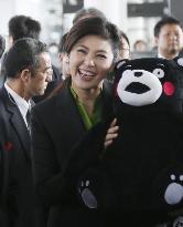 Yingluck boards Kyushu Shinkansen train