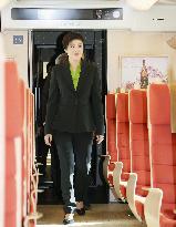 Yingluck boards Kyushu Shinkansen train