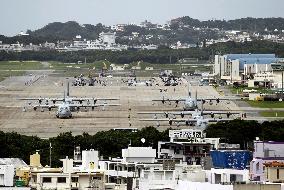 Japan, U.S. to move 9,000 Marines out of Okinawa