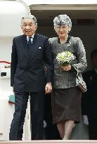 Japanese imperial couple return home from London