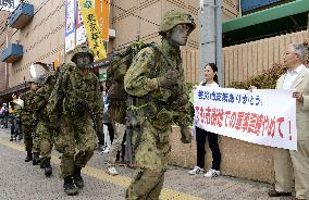 Armed GSDF troops march in Tokyo for drill