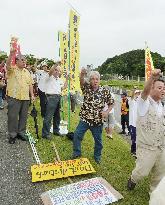 Okinawa residents opposed to Osprey deployment