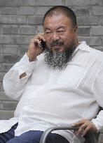 China artist Ai Weiwei banned from his company's court case