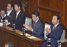 Japan's lower house OKs sales tax hike legislation