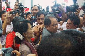 Suu Kyi back home