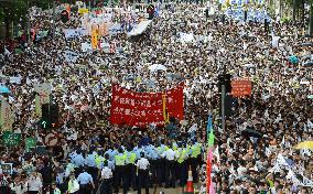 Protest marks H.K. handover anniversary