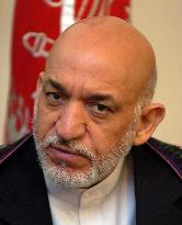 Karzai hopes Kyoto meet will lead to talks with Taliban