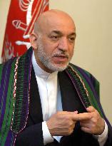Karzai hopes Kyoto meet will lead to talks with Taliban