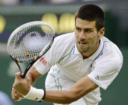 Djokovic defeated by Federer at Wimbledon