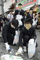 Hacker group Anonymous cleans up Shibuya street