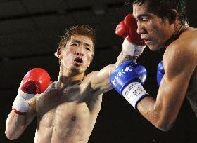 Sato retains WBC super flyweight title