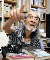 Veteran photographer Fukushima speaks of atomic-bomb attacks