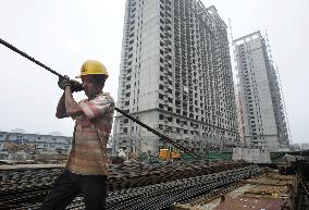China's April-June economic growth slows to 7.6%