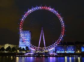 London Eye lit up before Olympics