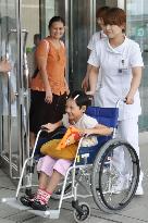 Myanmar girl leaves Okayama hospital after surgery