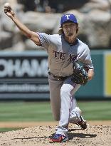 Darvish goes 7 innings for 11th win