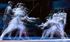 Ota and Kleibrink compete in men's fencing individual foil