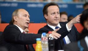 Cameron, Putin visit Olympic judo venue in London