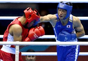 Japan's Murata reaches last 8 in middleweight boxing