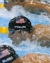 Phelps wins gold in men's 100m butterfly