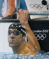 Phelps wins gold in men's 100m butterfly