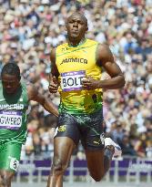 Jamaica's Bolt through to men's 100-meter semis