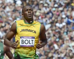 Jamaica's Bolt through to men's 100-meter semis