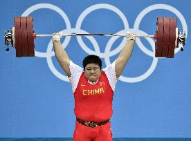 China's Zhou sets world record, wins gold in