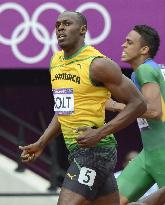 Jamaica's Bolt cruises into men's 200-meter semifinals