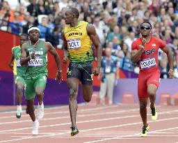 Jamaica's Bolt cruises into men's 200-meter semifinals