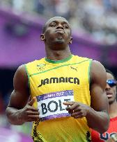 Jamaica's Bolt cruises into men's 200-meter semifinals