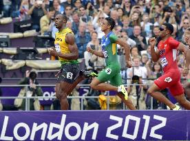 Jamaica's Bolt cruises into men's 200-meter semifinals