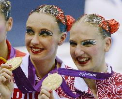 Russia wins Olympic synchro duet