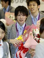 Gold medalist Uchimura returns home