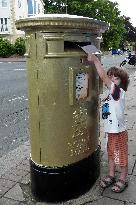 Gold postbox in London