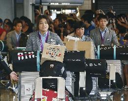 Japanese Olympic delegation arrives back in Japan