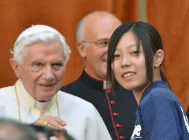 Choir members from Fukushima sing before Pope