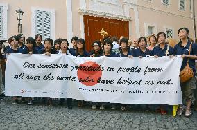 Choir members from Fukushima sing before Pope