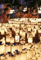 Candles lit for people of Fukushima