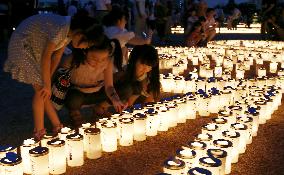 Candles lit for people of Fukushima