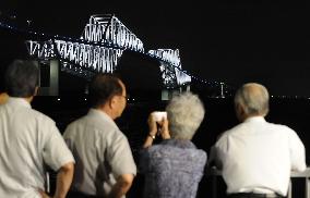 Tokyo Gate Bridge lit up in blue in hope for rescue of abductees