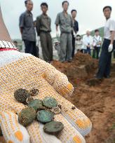 Buttons found at burial site for Japanese in N. Korea