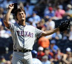 Darvish flirts with no-hitter, gets 14th win