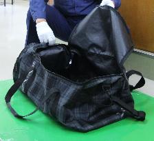 Man arrested for forcing schoolgirl into bag