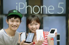Apple's new iPhone hits Japanese market