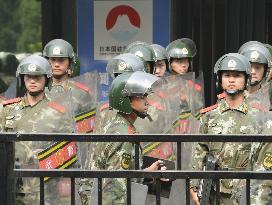 Police officers at Japanese Embassy in Beijing